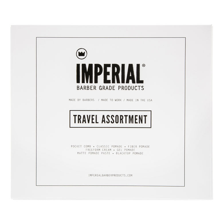 Front of the closed Imperial Barber Grade Products Travel Assortment box, listing Pocket Comb, Classic Pomade, Fiber Pomade, Freeform Cream, Gel Pomade, Matte Pomade Paste, and Blacktop Pomade.